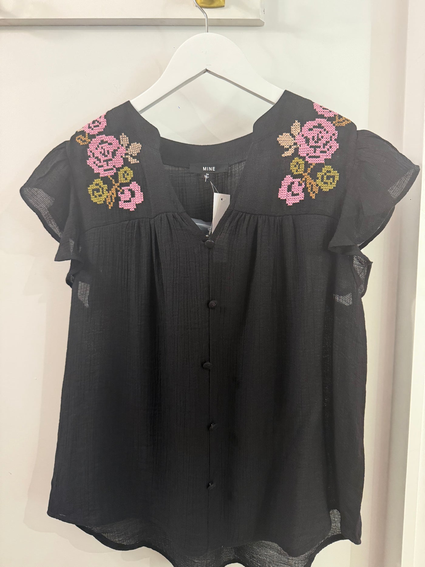 The Pink Door Flower Cross Stitch Ruffle Top Black