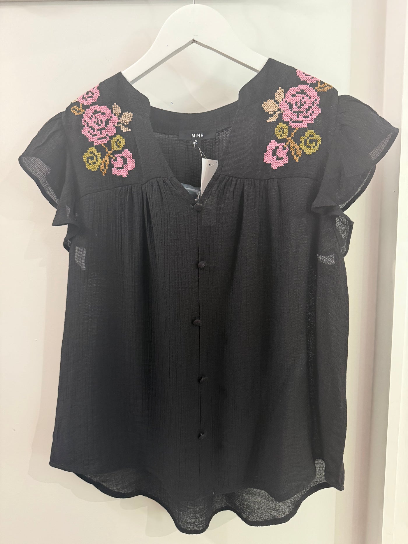 The Pink Door Flower Cross Stitch Ruffle Top Black