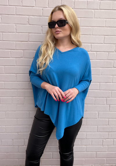 Stark X Soft Solid Asymmetrical V Neck Top - Sky Blue