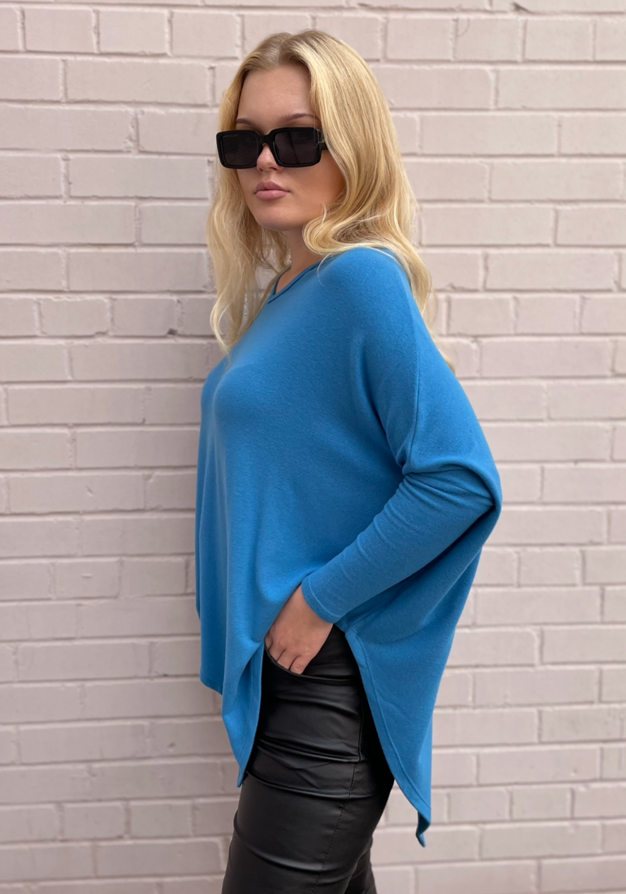 Stark X Soft Solid Asymmetrical V Neck Top - Sky Blue