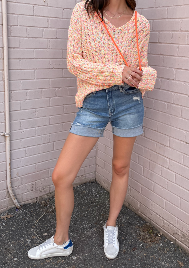 The Pink Door Distressed Raw Edge Denim Shorts - Light Wash