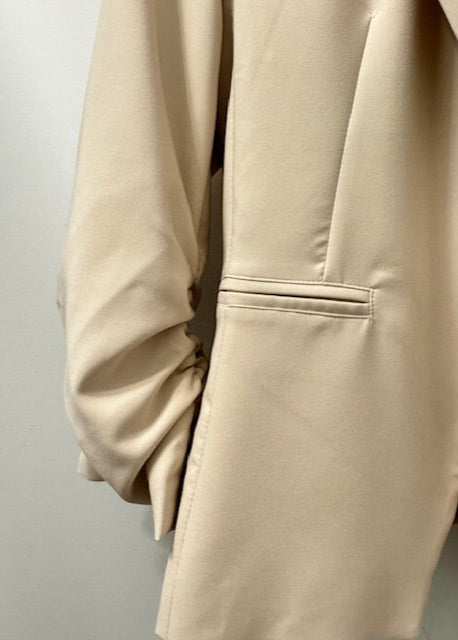 The Pink Door Ruched Sleeve Short Blazer Beige