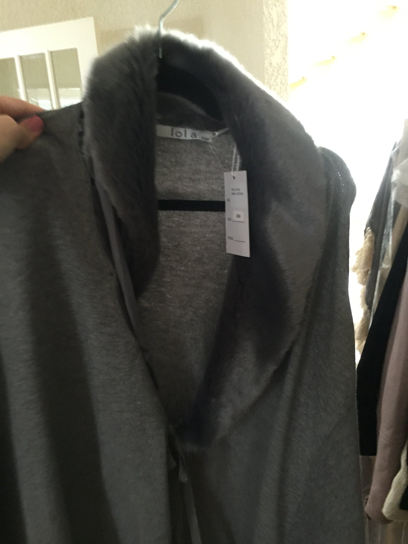 Grey poncho with faux fur trim