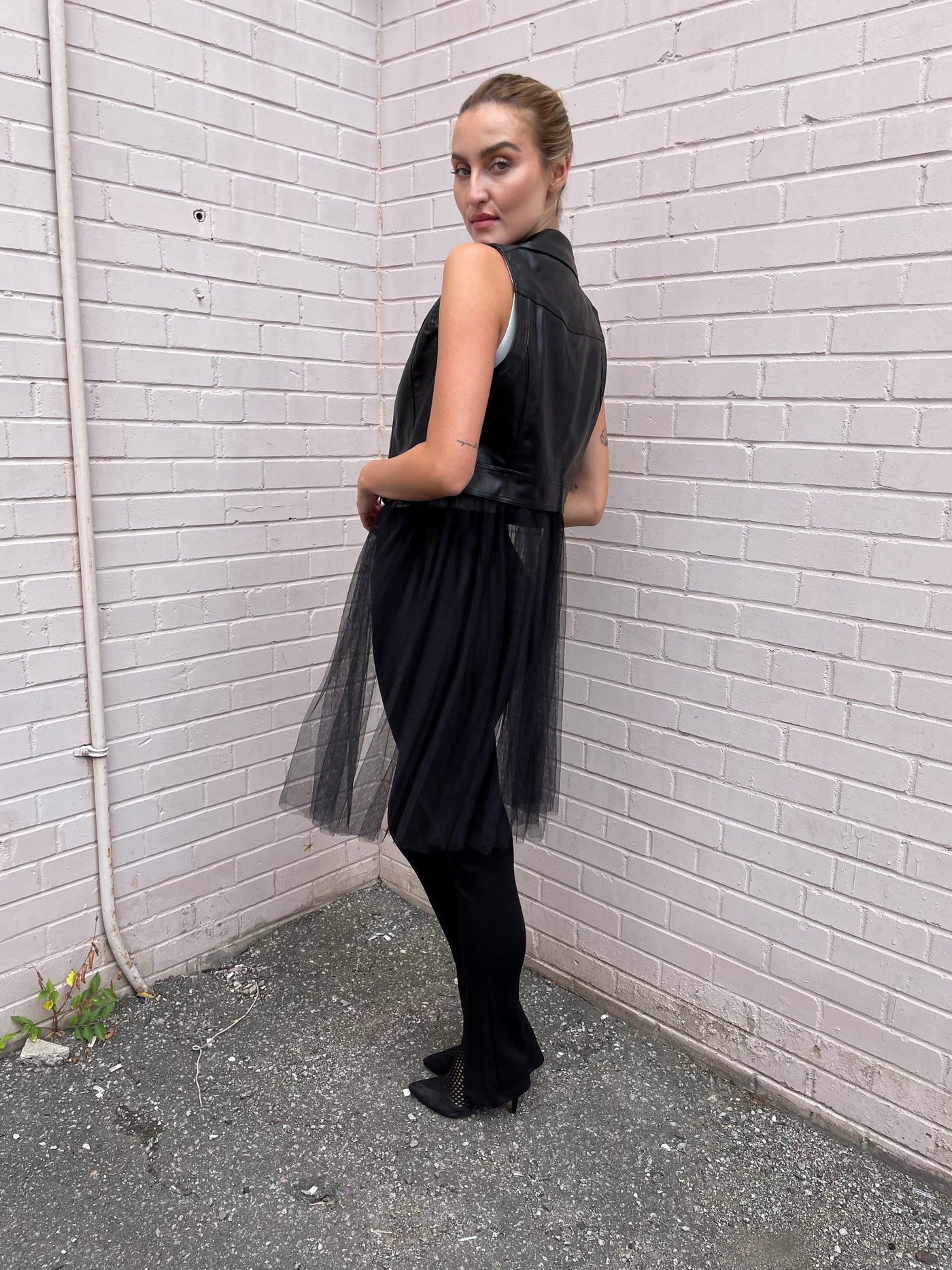 The Pink Door Faux Leather Vest w/ Tulle Trim