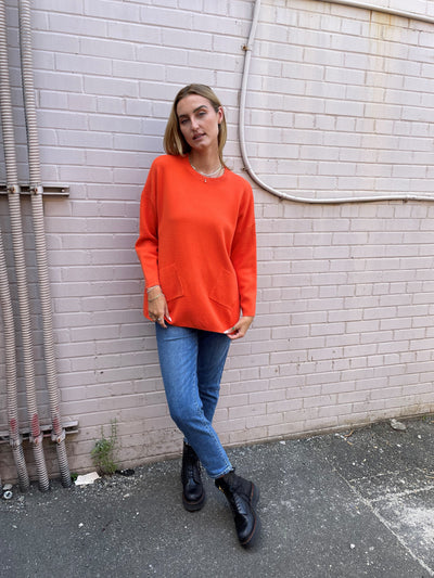 The Pink Door Orange Knit Sweater with Pockets