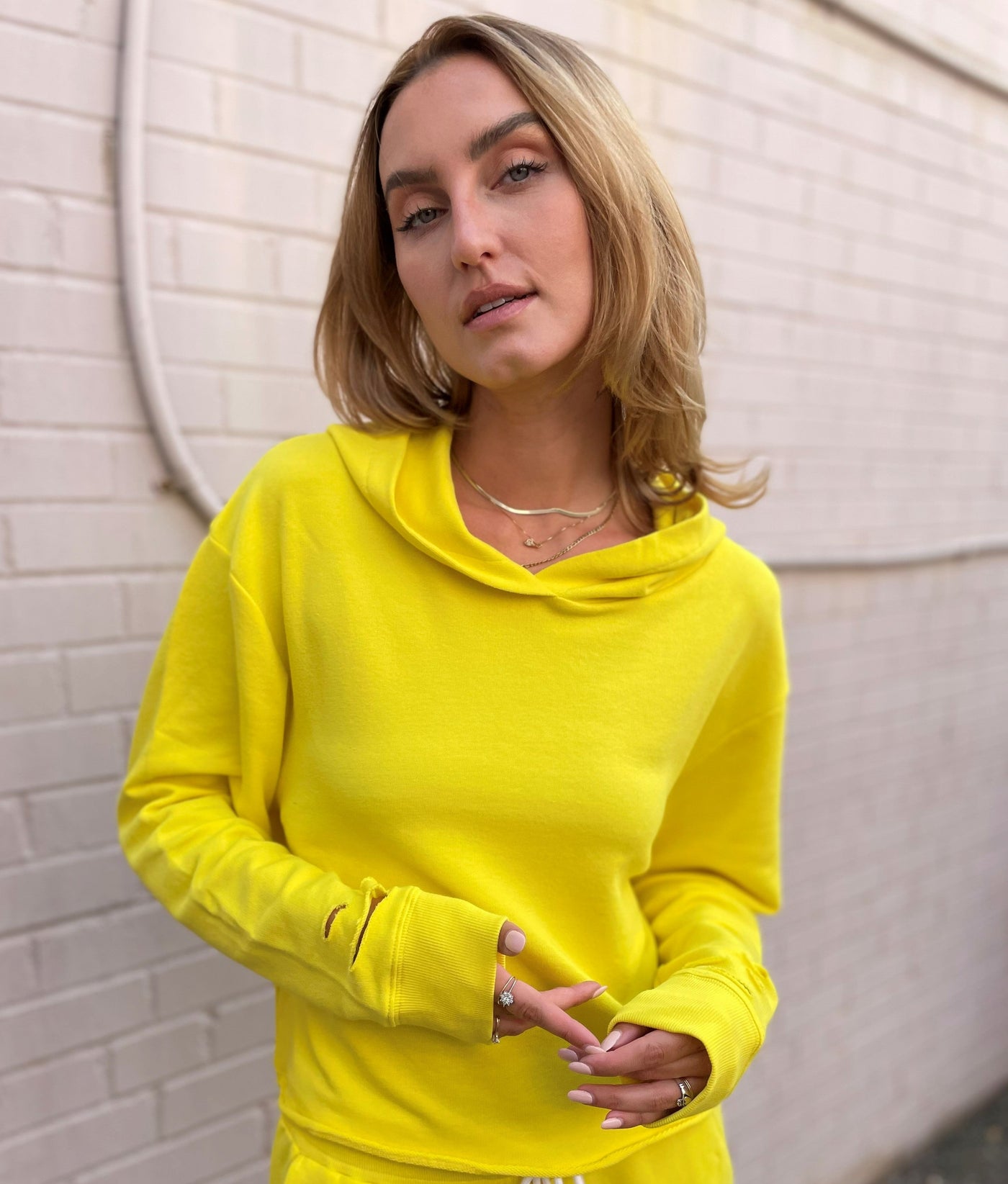 CHRLDR Chloe Bright Yellow Cutout Hoodie