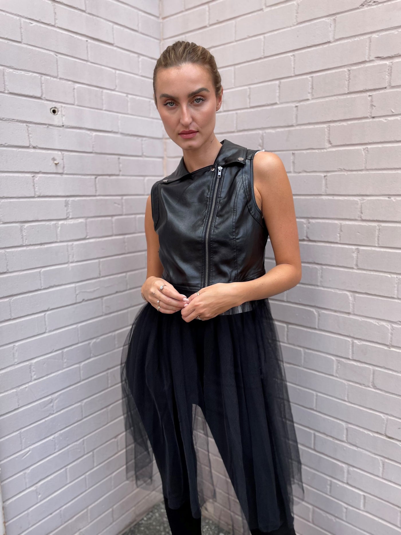 The Pink Door Faux Leather Vest w/ Tulle Trim