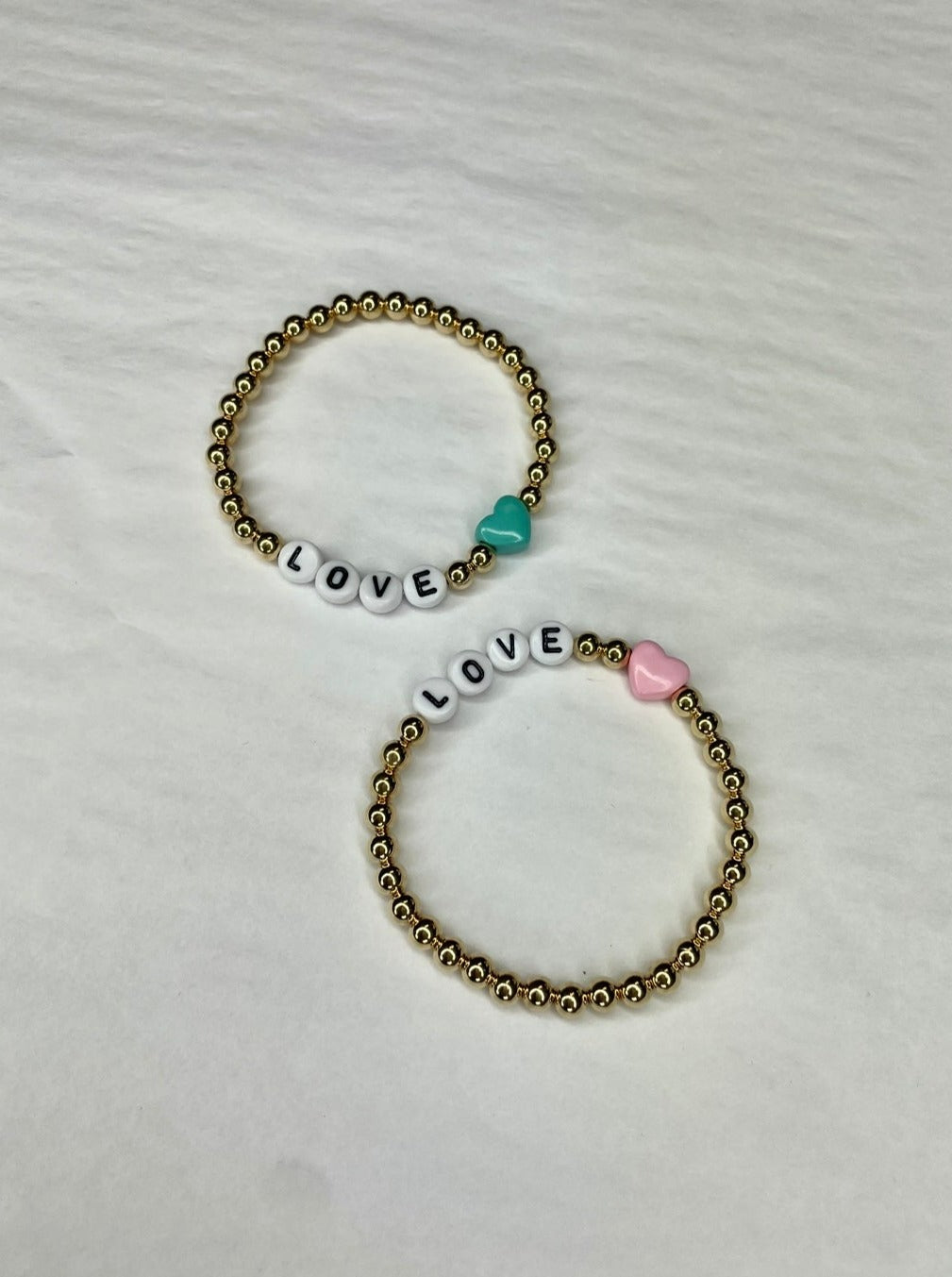 The Pink Door Gold Beaded “Love” Bracelet