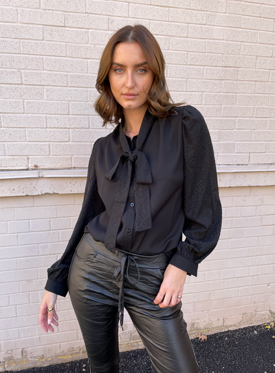 The Pink Door Glitter Black Bow Blouse